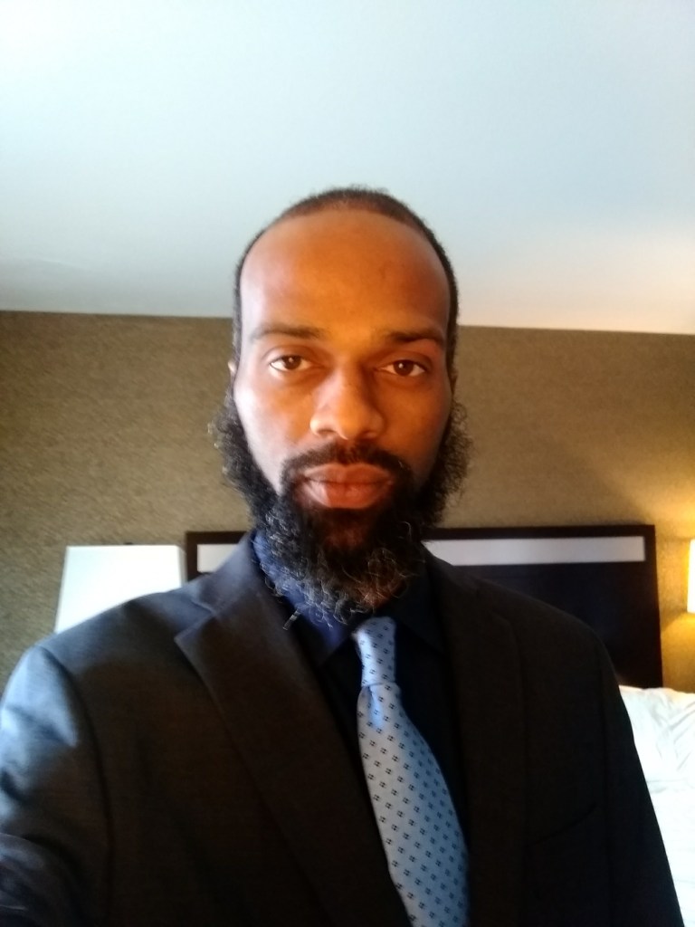 Headshot of Mzee Kambui, founder of Abstract World Media